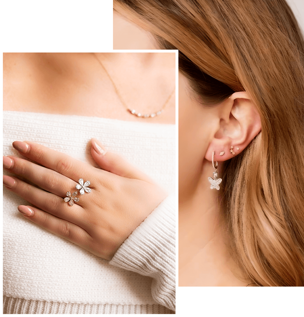 person wearing flower-shaped diamond ring and butterfly earrings